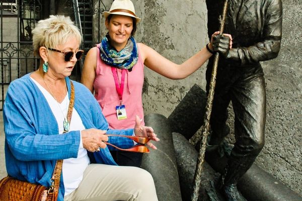 Full Day Private Tour Guest learning how to play the musical spoons on a quebec city tour