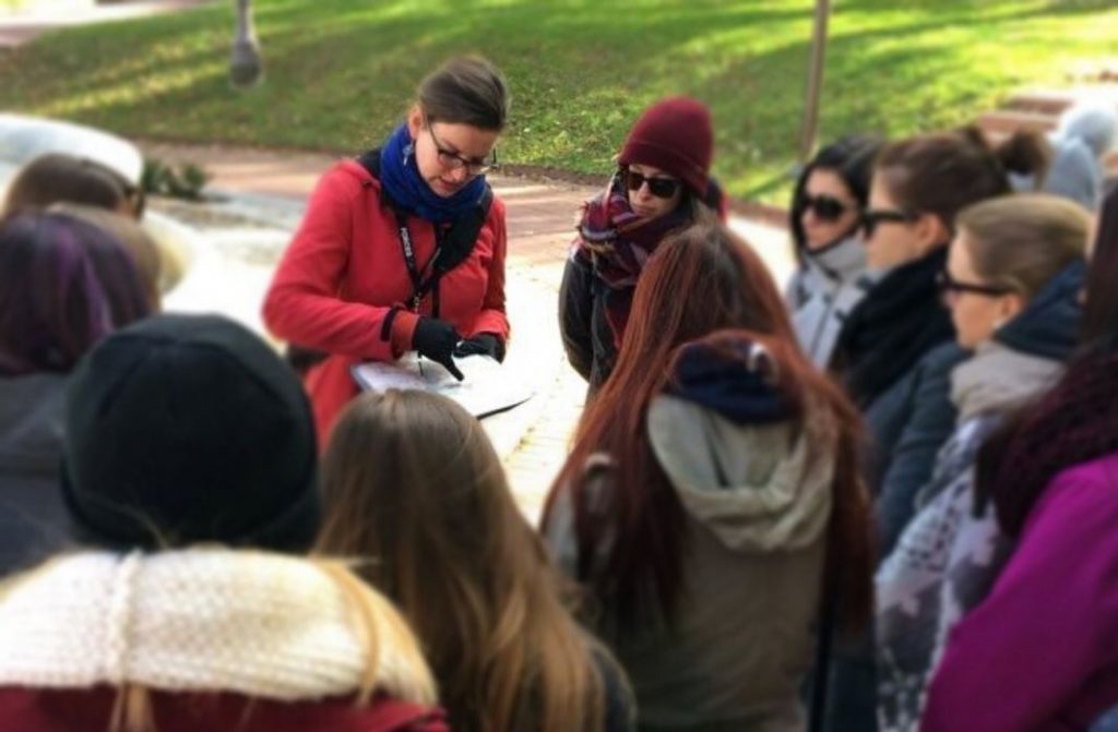 marie pierre guiding a group of students in quebec city