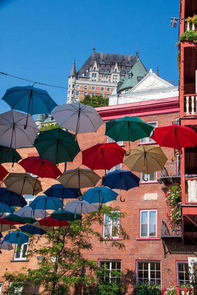 Umbrella Alley in Quebec City and chateau Frontenac in background