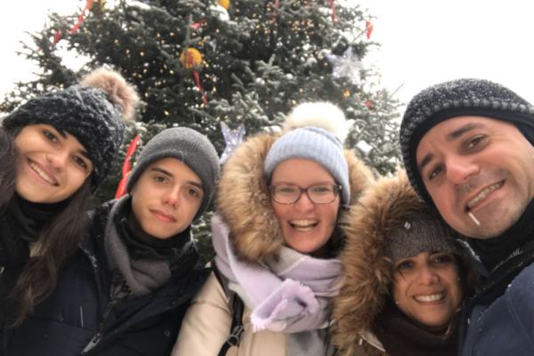 family group with Christmas tree